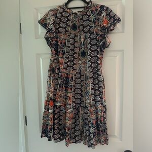 NWT navy graphic dress size small.  It is lined and has pockets
